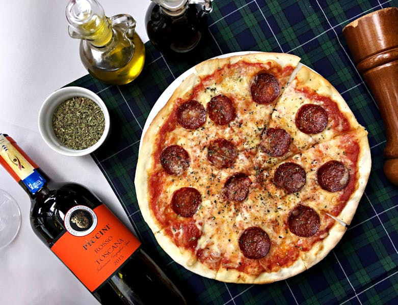 Quattro Stagioni pizza from Punch pizza artisan menu