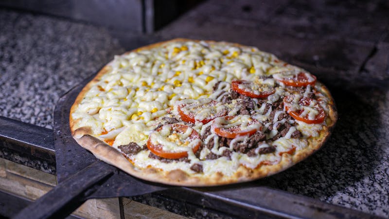 Punch pizza Instagram — pizza fresh from the oven