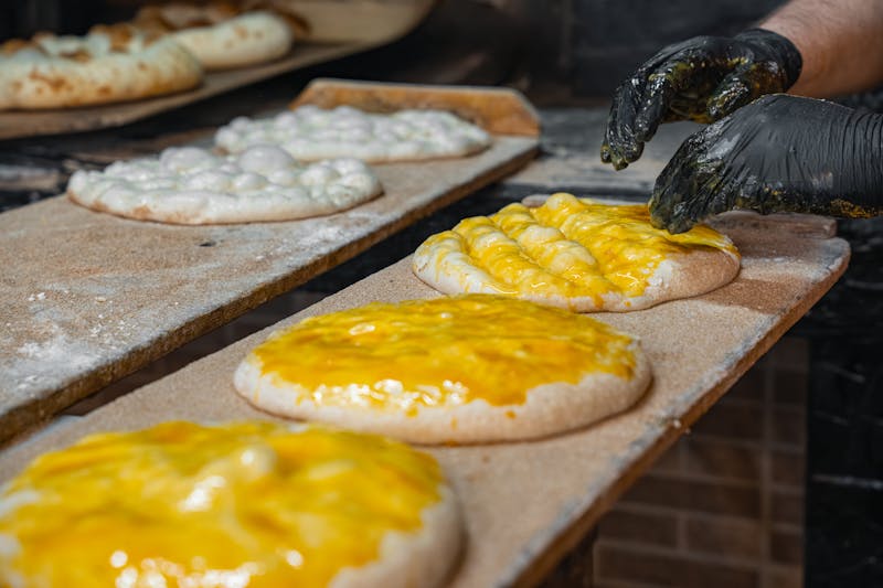 Punch pizza Instagram — artisan dough stretching