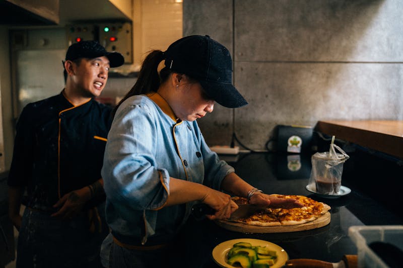 Punch pizza kitchen team crafting artisan pizzas in Minneapolis